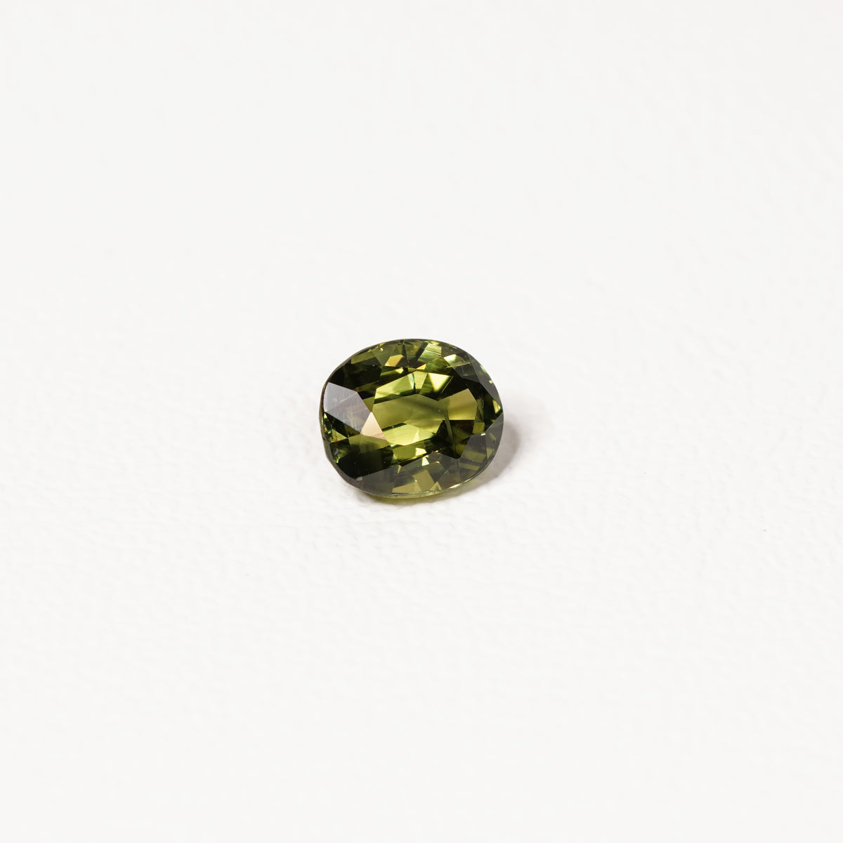 Australian green sapphire 2.10ct oval — saturated green colour zoning at angle — Ruhuna Gemstones