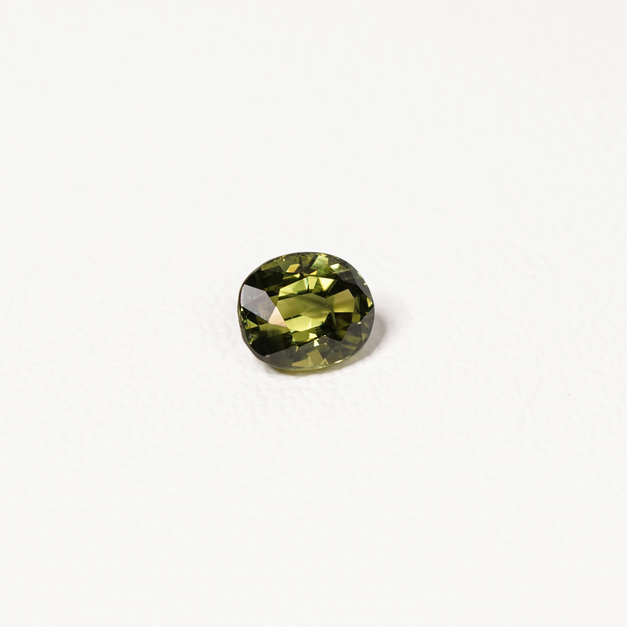 Australian green sapphire 2.10ct oval — saturated green colour zoning at angle — Ruhuna Gemstones