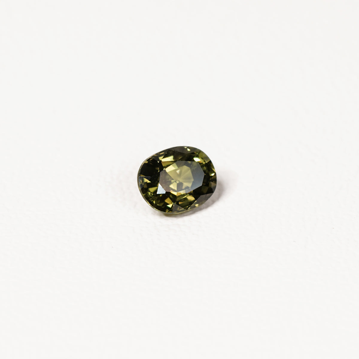 1.70ct Australian parti sapphire oval — deep olive to forest green, face-up view — Ruhuna Gemstones