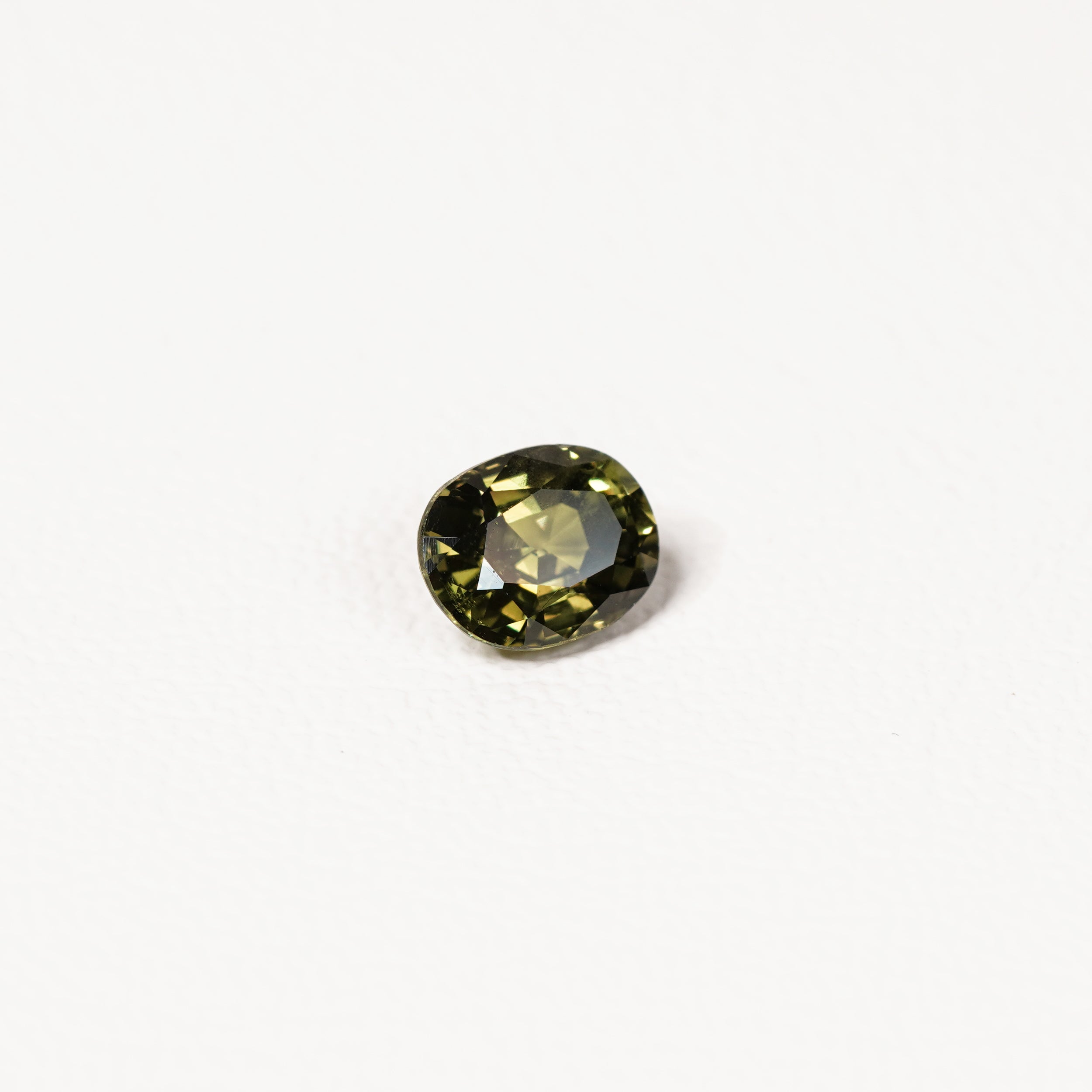1.70ct Australian parti sapphire oval — deep olive to forest green, face-up view — Ruhuna Gemstones