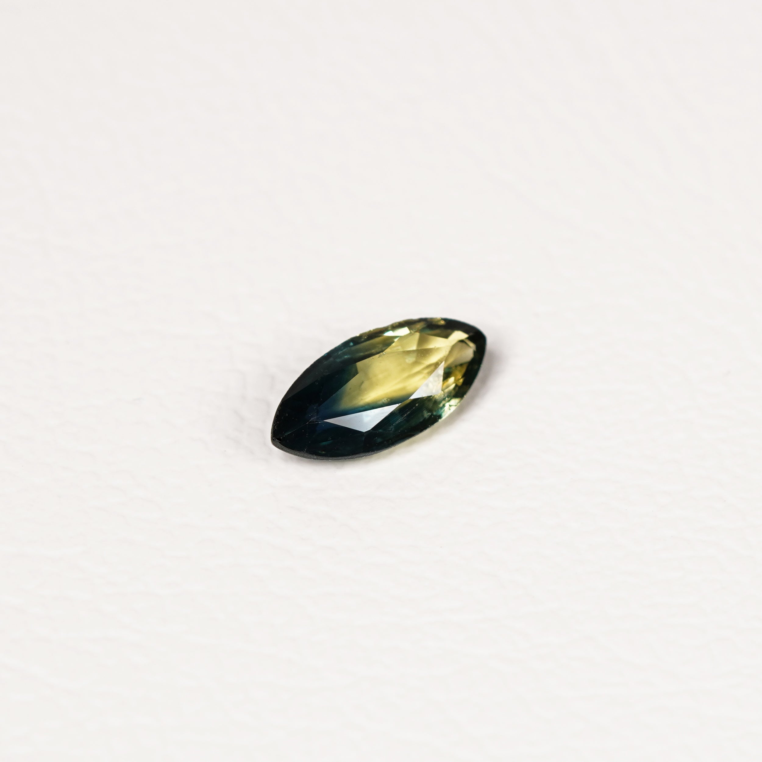 Australian Teal 1.1CT Marquise cut sapphire hand view — Ruhuna Gemstones