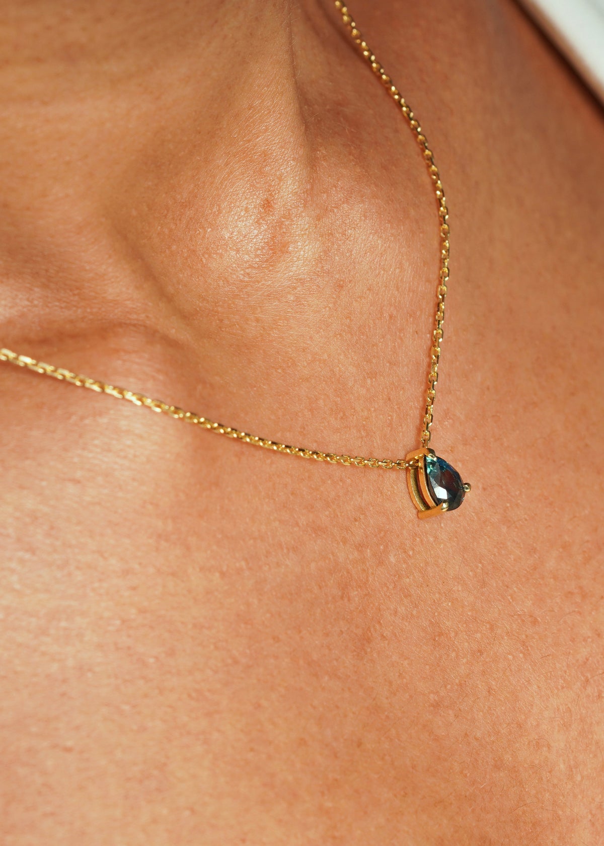 Madagascar Teal 1.2CT Mirissa Hidden Bail - 1.2Ct Pear Sapphire Necklace sapphire necklace top-down view — Ruhuna Gemstones