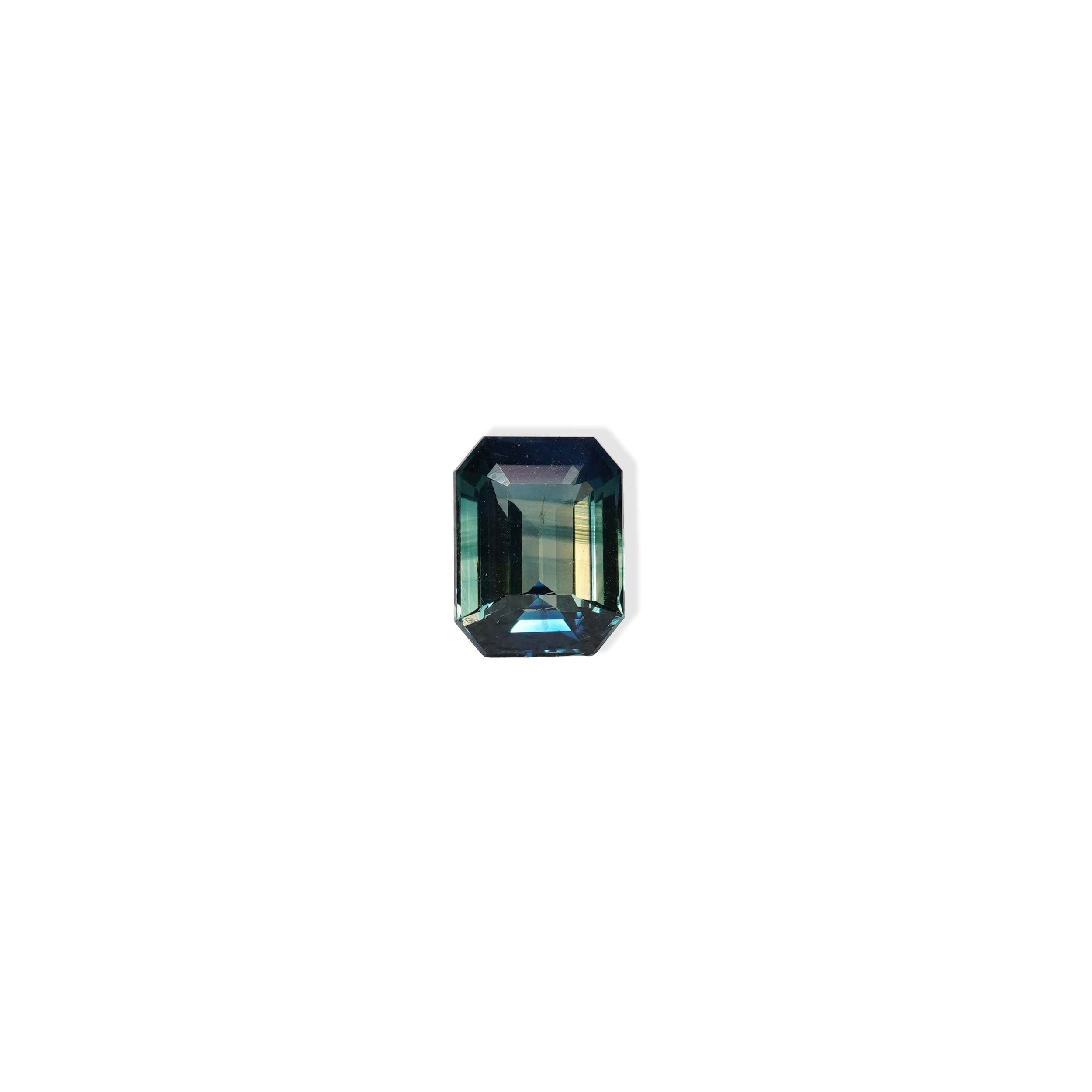 2.02 carat emerald cut teal parti sapphire with blue and green