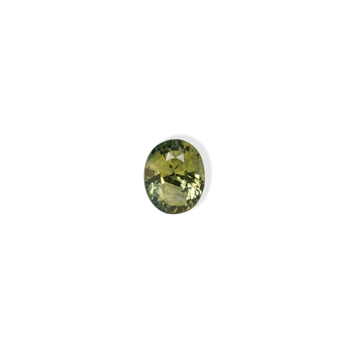 1 carat pear parti teal sapphire with mixed green and yellow color.