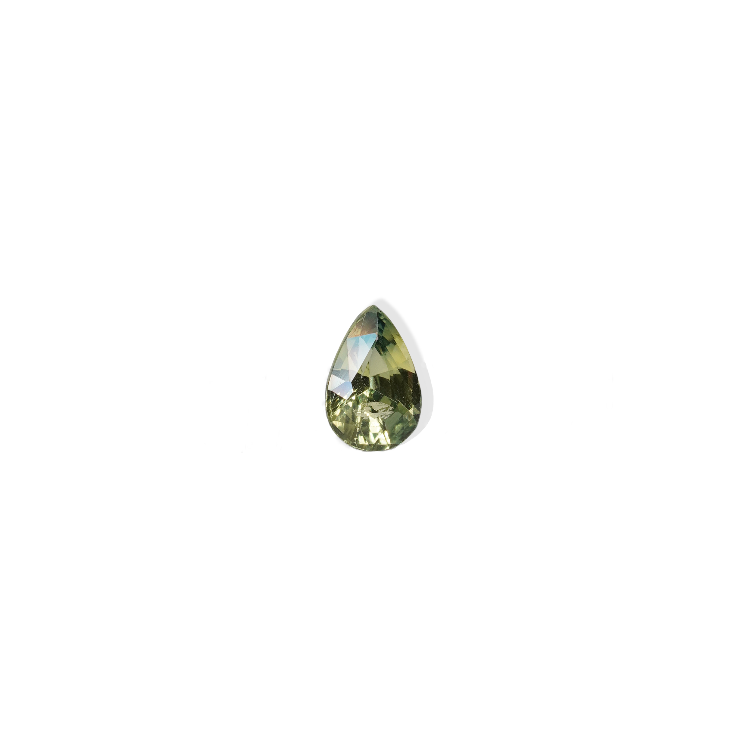 1 carat pear parti teal sapphire with mixed green and yellow color.