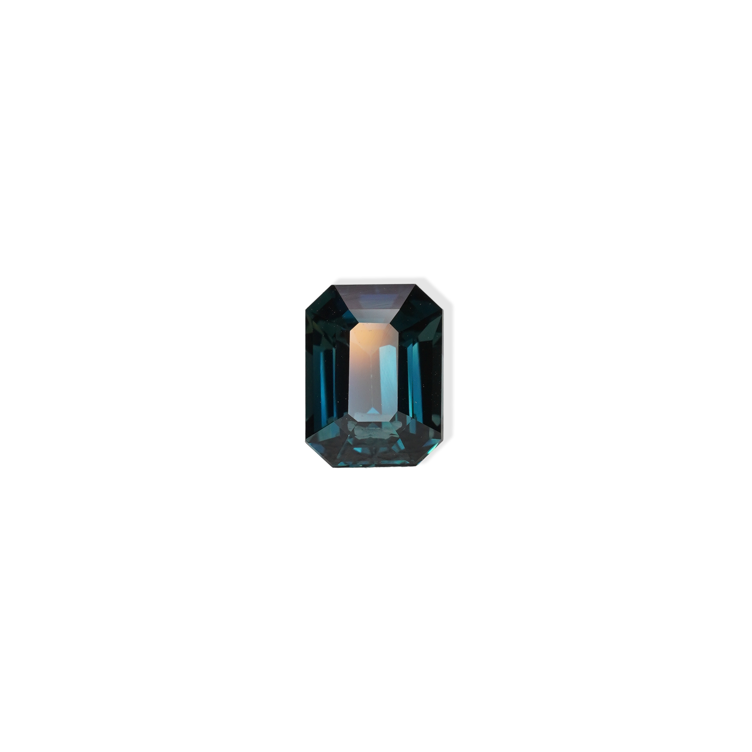 3.06 carat emerald cut teal parti sapphire with blue and green