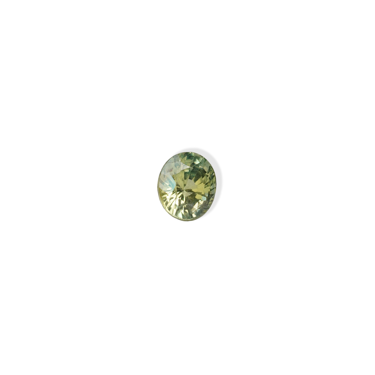 1 carat pear parti teal sapphire with mixed green and yellow color.
