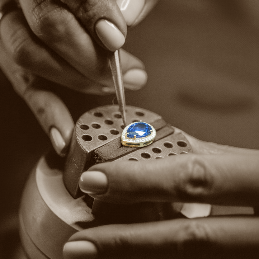 A sapphire being hand-set at the Ruhuna Gemstones Brisbane atelier bench