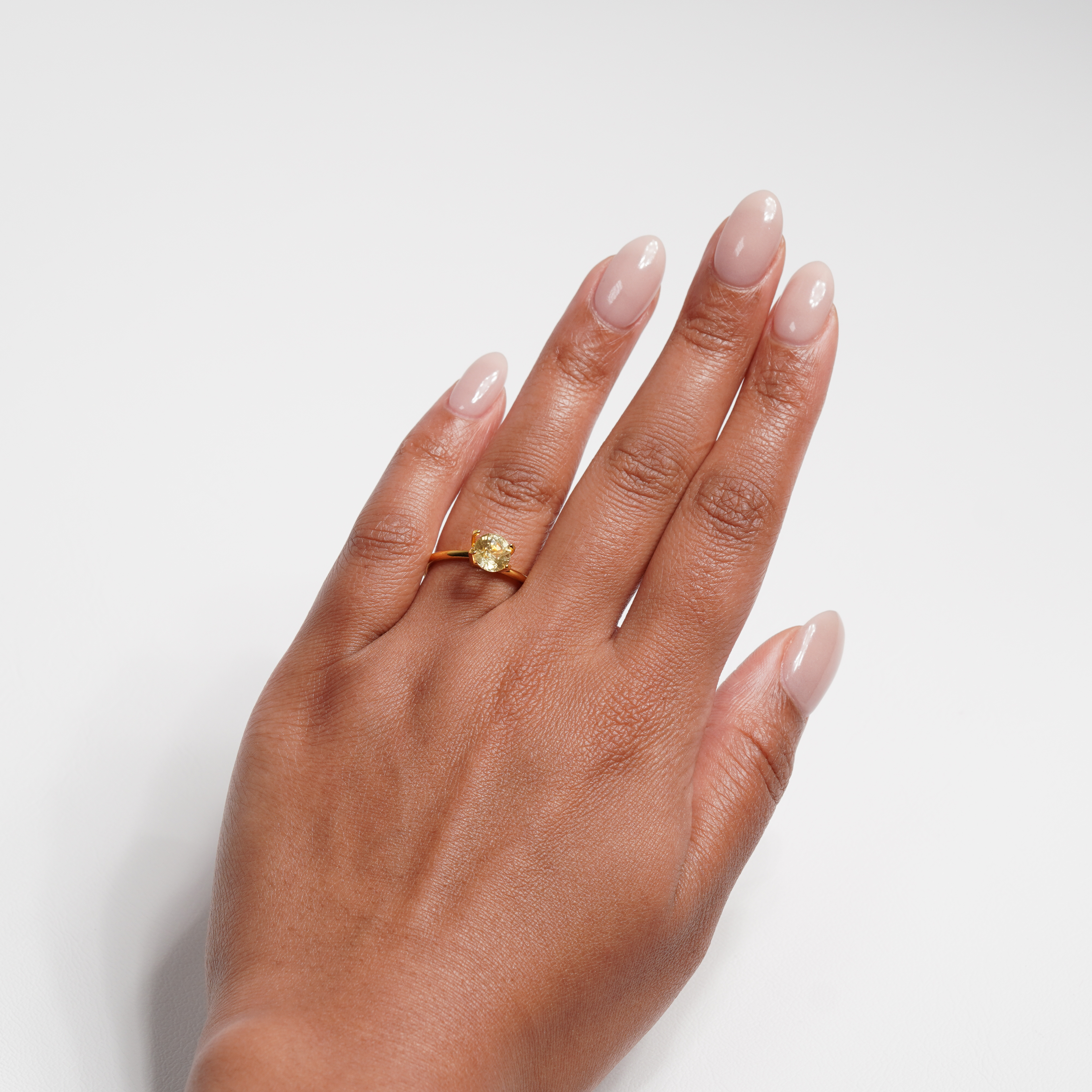 1.56 carat round cut yellow ceylon sapphire ring