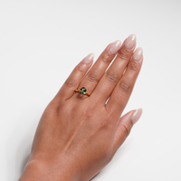 1.3 carat oval parti teal sapphire ring with mixed green and blue color.