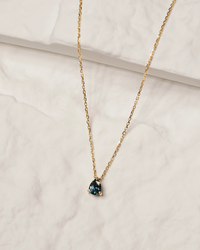 Madagascar Teal 1.2CT Mirissa Hidden Bail - 1.2Ct Pear Sapphire Necklace sapphire necklace hand view — Ruhuna Gemstones