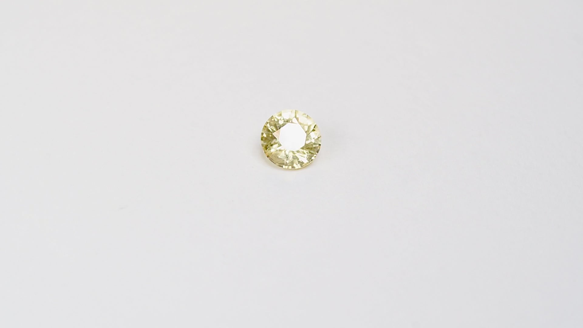 1.56 carat round cut yellow ceylon sapphire