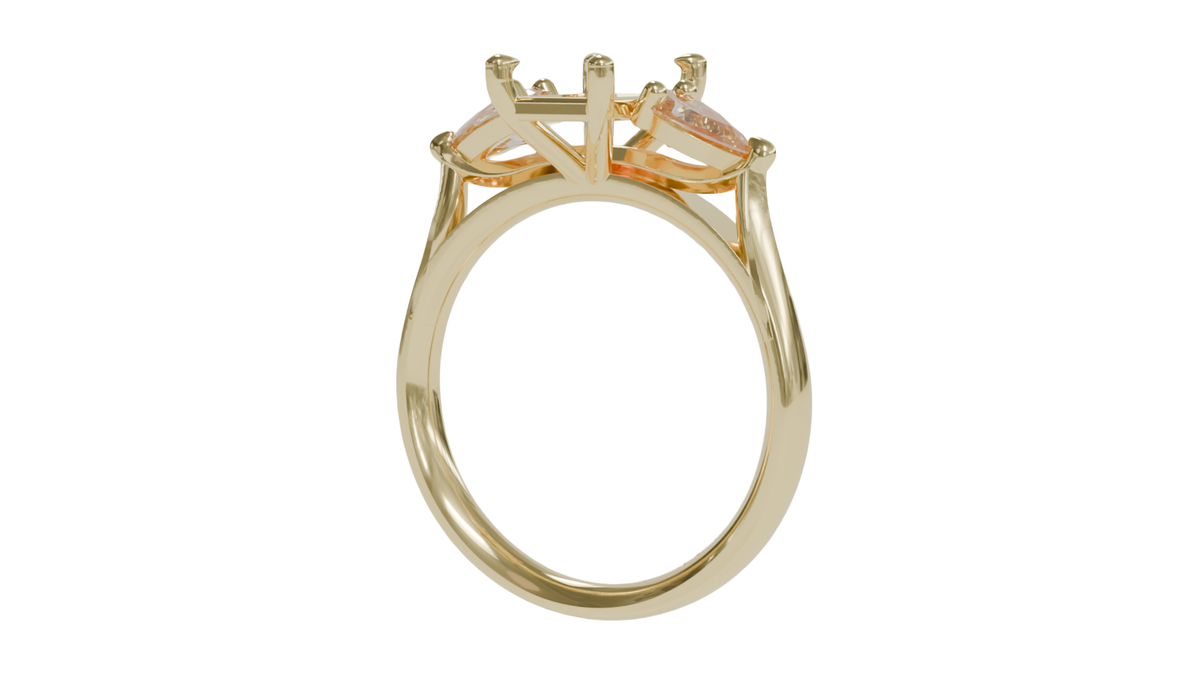 18 CARAT YELLOW GOLD Sapphire engagement ring with pear cut diamonds.