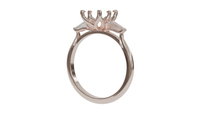 lotus setting trilogy sapphire engagement ring with tapered baguette diamonds in 18ct rose gold