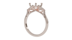 lotus setting trilogy sapphire engagement ring with pear cut diamonds in 18ct rose gold