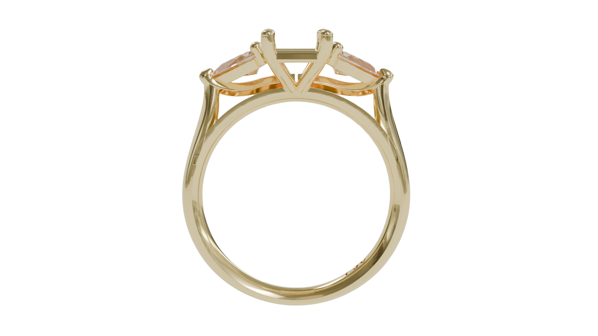 18 CARAT YELLOW GOLD Sapphire engagement ring with pear cut diamonds.