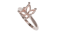 lotus setting engagement ring with pear in 18ct rose gold.
