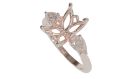 lotus setting trilogy sapphire engagement ring with pear cut diamonds in 18ct rose gold