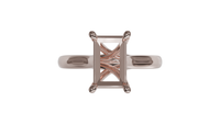 sapphire engagement ring with hidden halo in 18ct rose gold. Cathedral setting. 