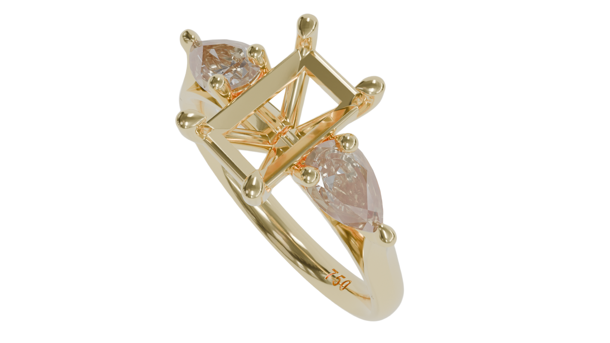18 CARAT YELLOW GOLD Sapphire engagement ring with pear cut diamonds.