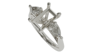 18 CARAT WHITE GOLD sapphire engagement ring with pear cut diamonds in 18ct white gold