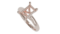 sapphire engagement ring with diamond pave hidden halo in 18ct rose gold. Cathedral setting. 