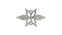 lotus setting trilogy sapphire engagement ring with pear cut diamonds in 18ct white gold